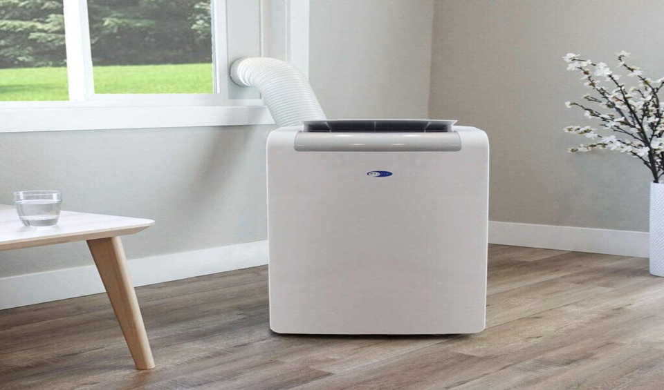 Portable air conditioner with condensate pump