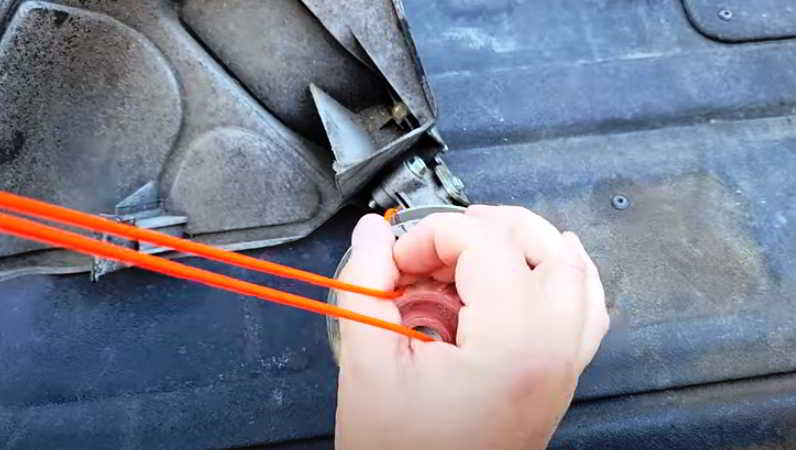 how to change the string in a ryobi expand it weed eater