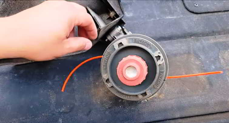 how to replace string on ryobi expand-it trimmer