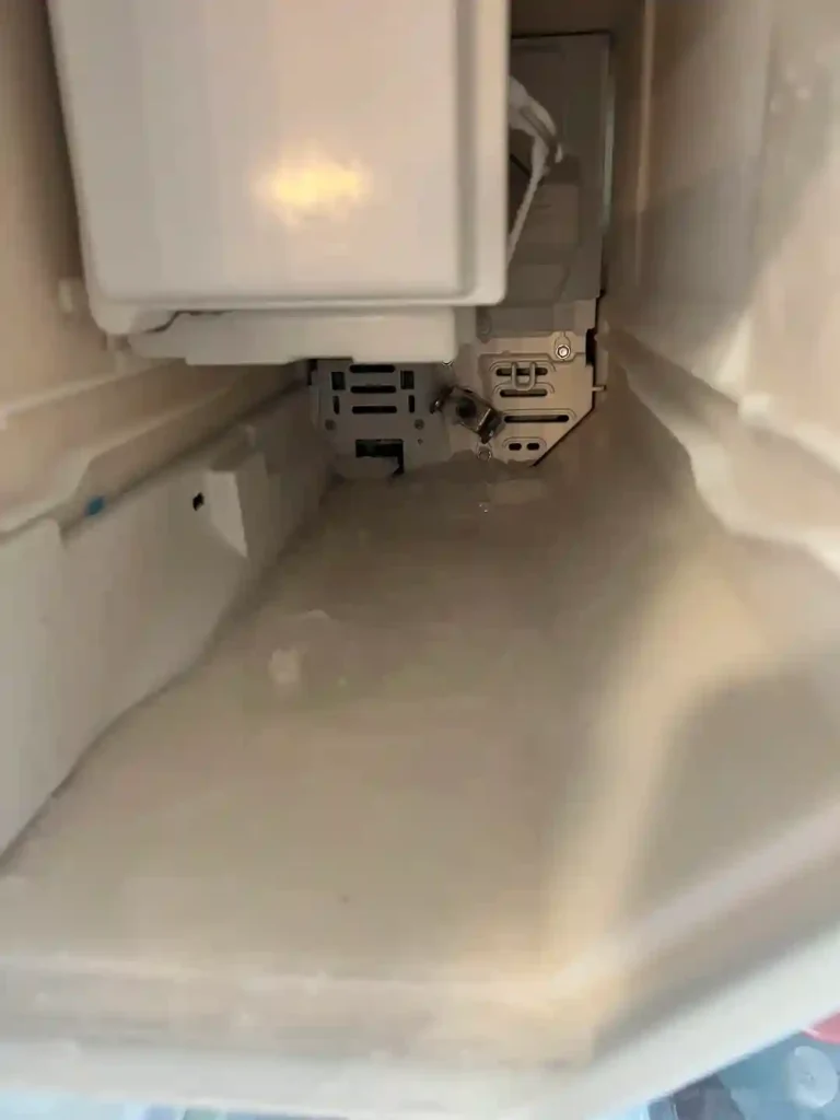 Next, let's focus on the ice maker itself. Sometimes, an ice cube can get stuck inside and jam the mechanism. Try reaching in carefully with your hand and see if you can free it. That might be all it takes to get it making ice again.